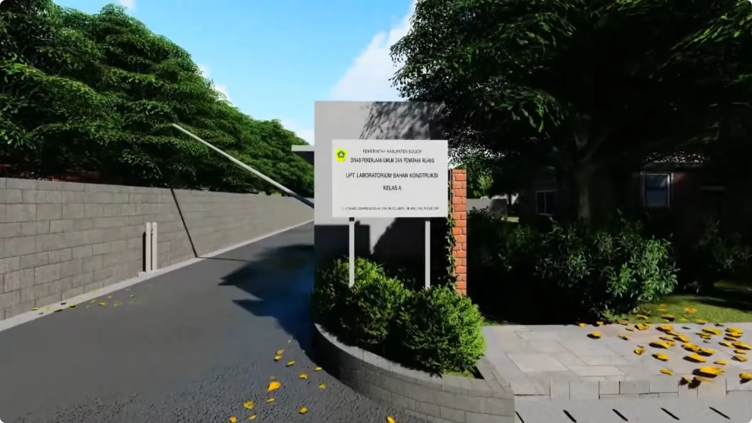 Jalan masuk kompleks dengan papan nama UPT Laboratorium Bahan Konstruksi dan dinding batu